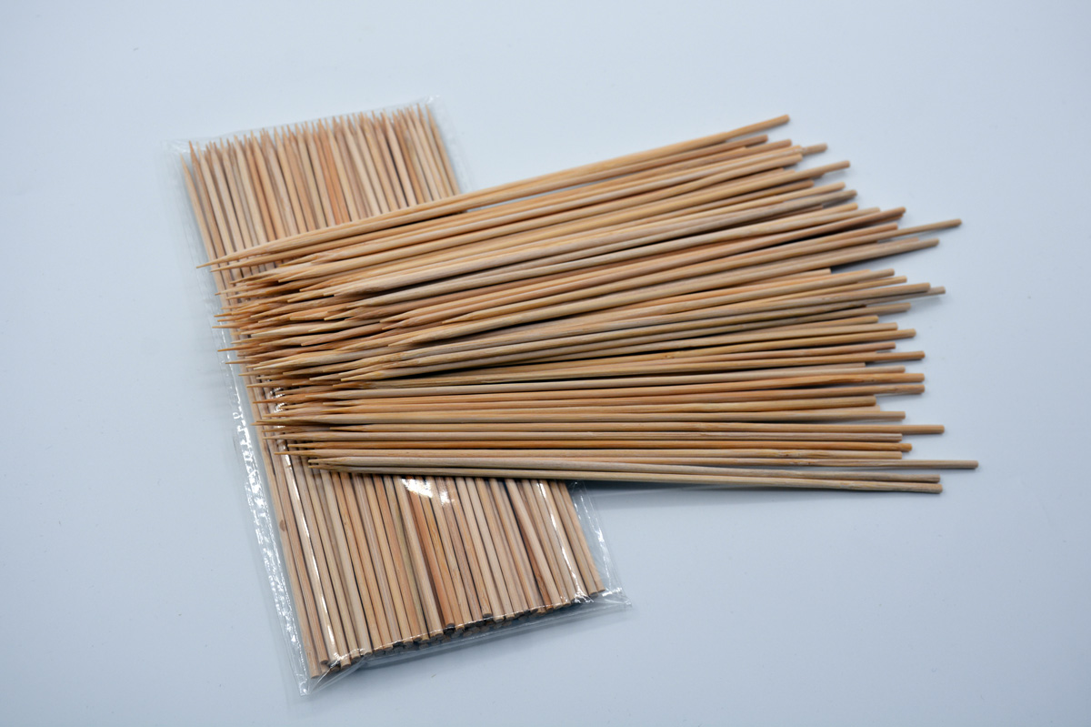 Why do bamboo sticks need to be dried during the production process